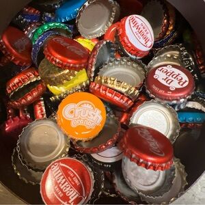 Lot of 100 soda bottle caps for projects and crafts